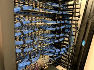 Backside of network patch panels data cable installation